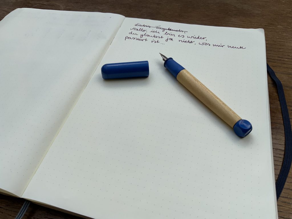 Notizbuch mit Stift